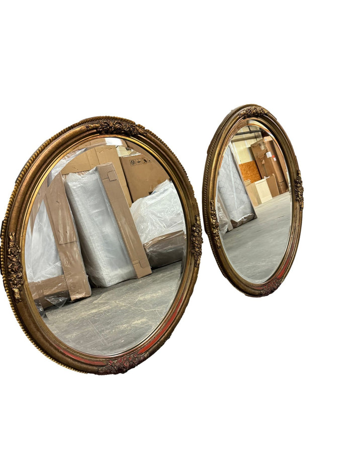 Pair of Gilded Wood-Carved Oval Mirrors