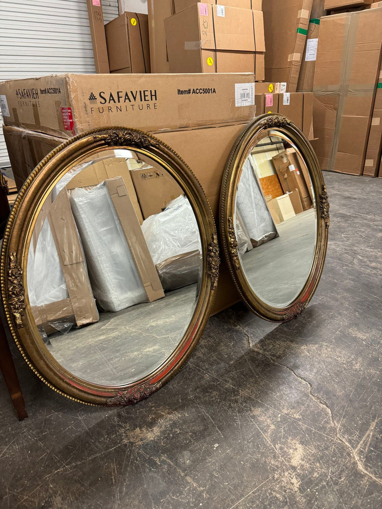 Pair of Gilded Wood-Carved Oval Mirrors